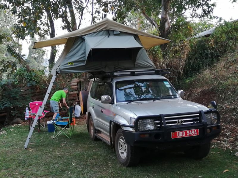 Land Cruiser TX with a rooftop tent